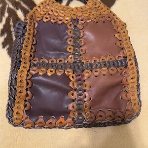 vintage, hand-woven linked leather tote bag.